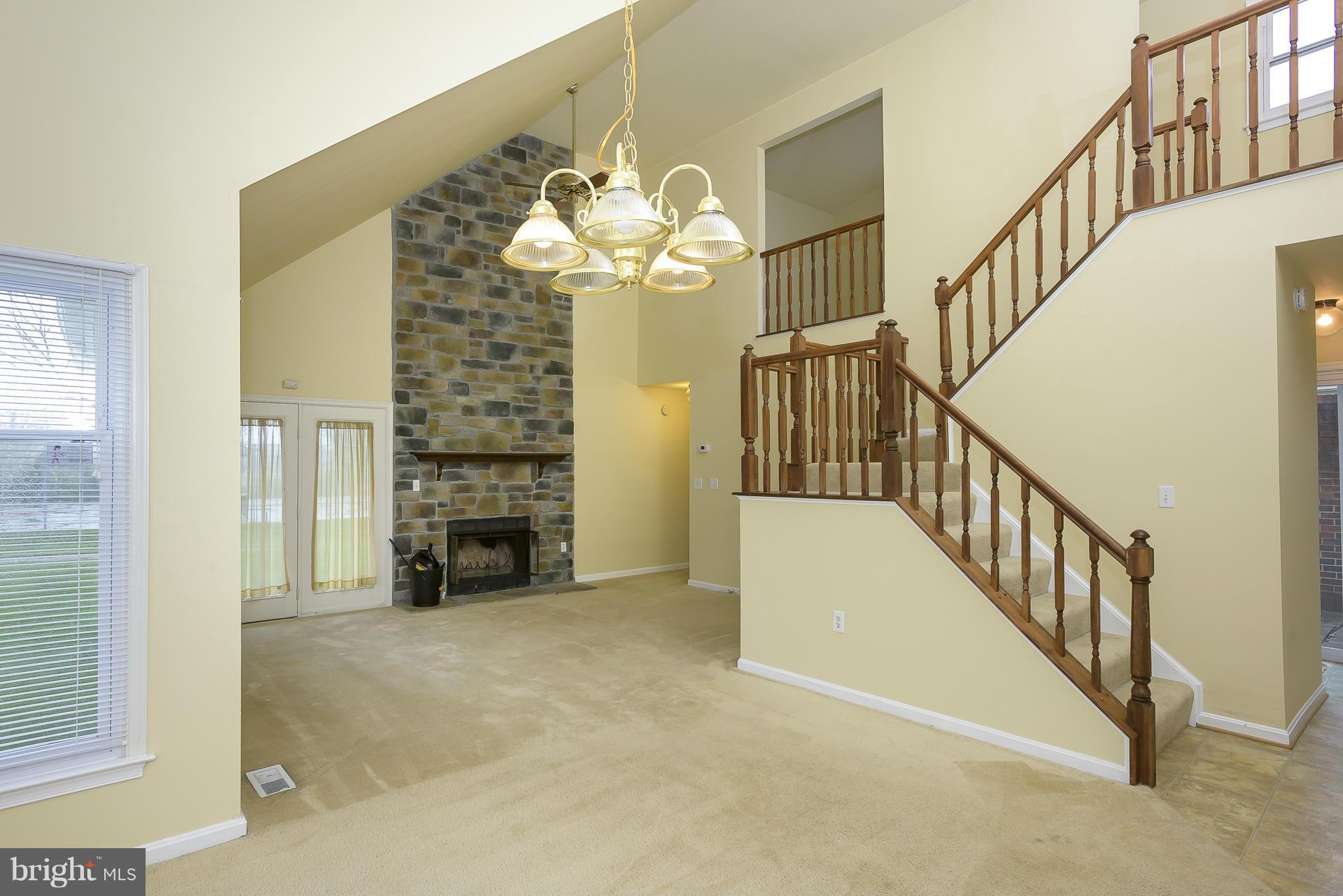 14243 Greenview Drive Laurel, MD 20708 - Photo 3 of 26 a view of a livingroom with a fireplace