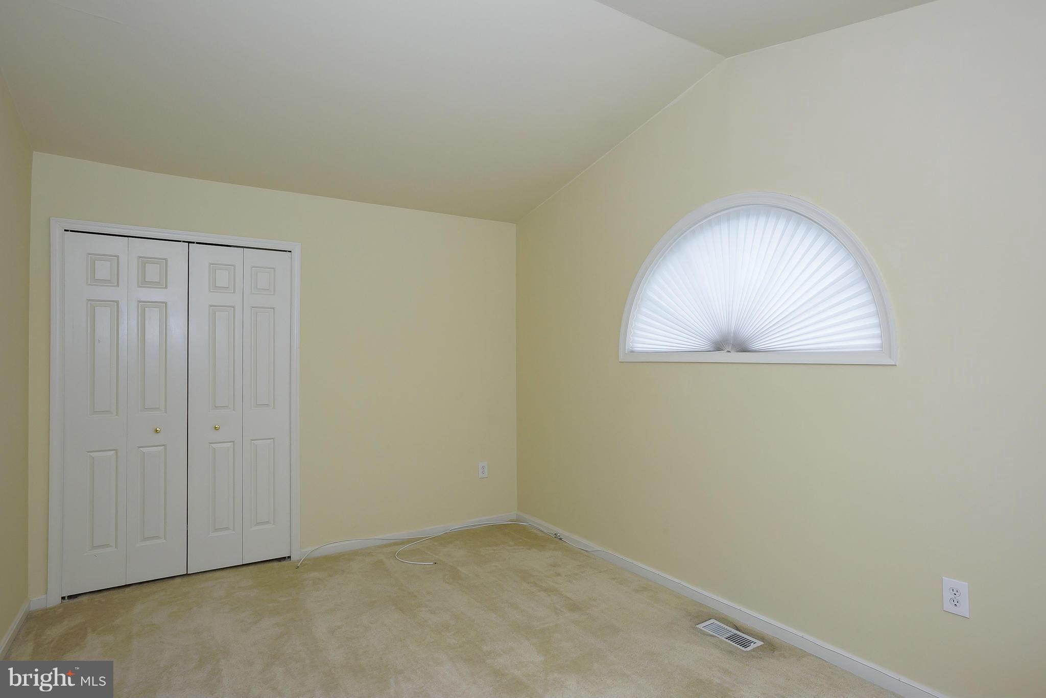 14243 Greenview Drive Laurel, MD 20708 - Photo 21 of 26 an empty room with a window