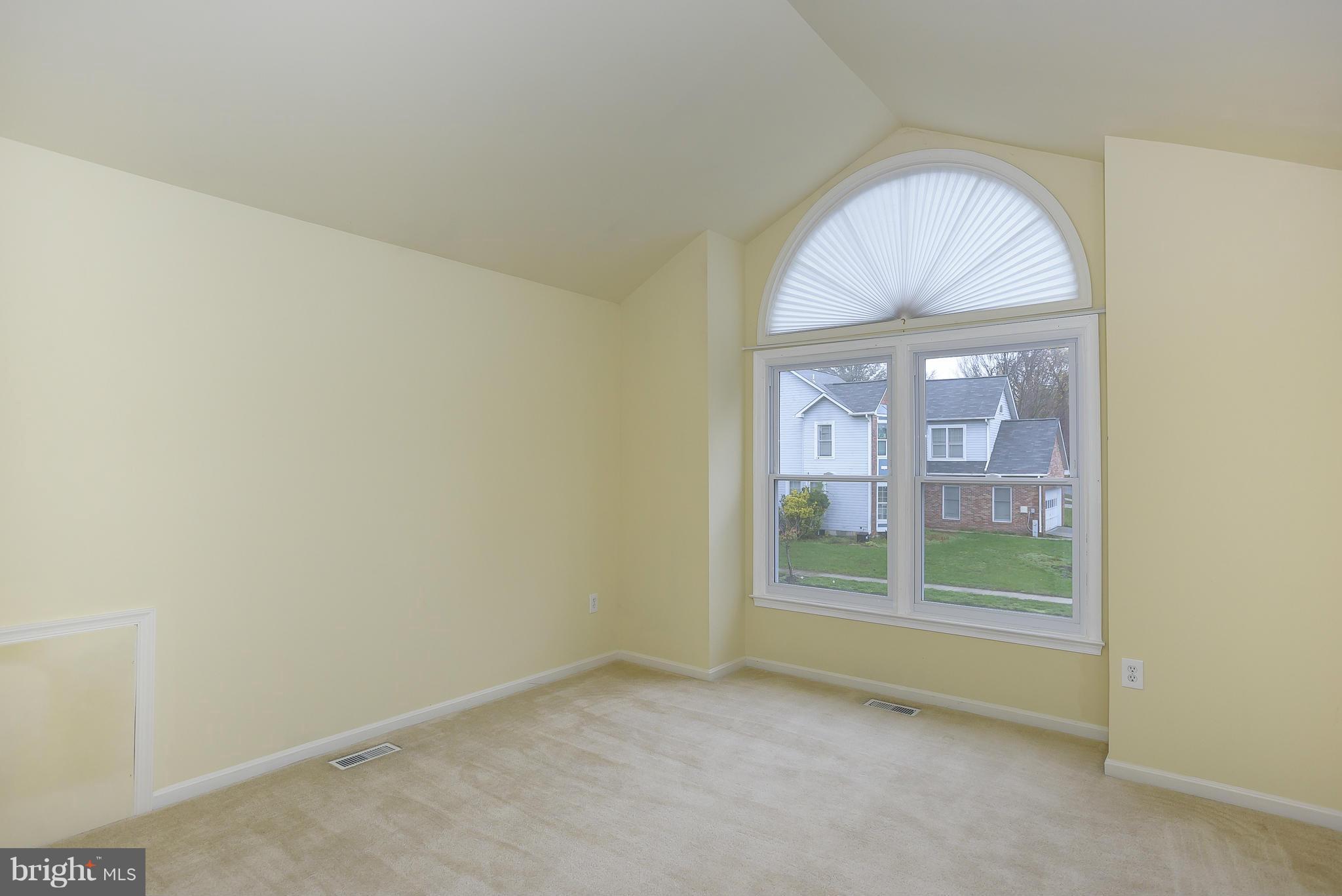 14243 Greenview Drive Laurel, MD 20708 - Photo 22 of 26 an empty room with windows
