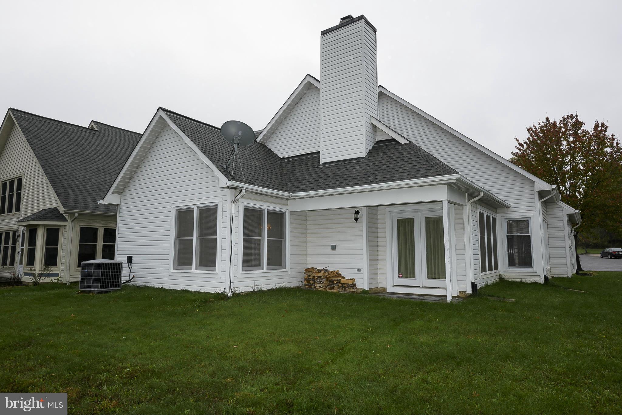 14243 Greenview Drive Laurel, MD 20708 - Photo 24 of 26 a view of a house with backyard