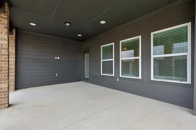 a view of a house with a large window