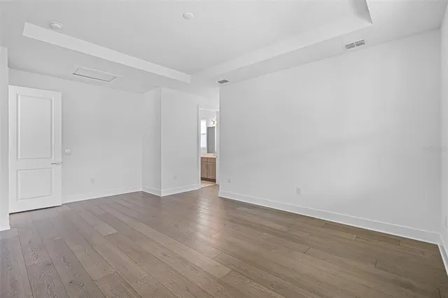 a bathroom with a double vanity sink and mirror