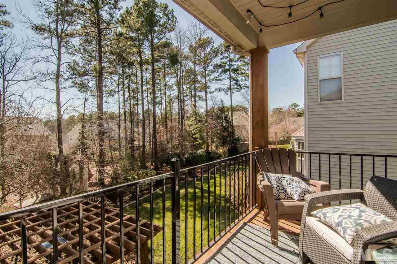 8214 Cushing Street Raleigh, NC 27613 - Photo 17 of 30 a view of balcony with furniture