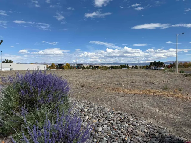 a view of an ocean and a building