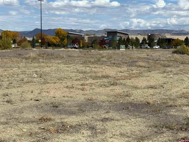 a view of a city with an ocean view