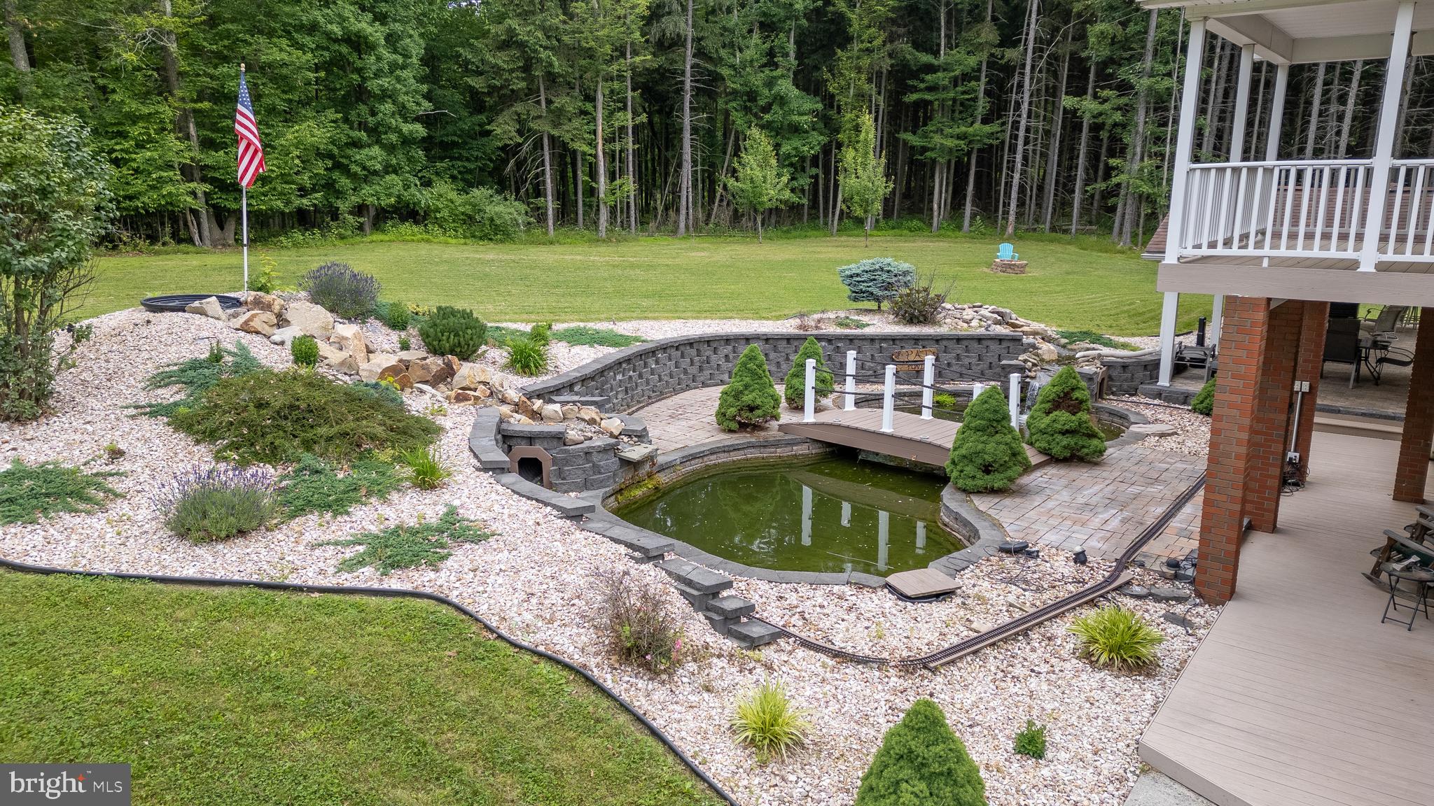 1296 Sunnyside Hollow Road Port Matilda, PA 16870 - Photo 11 of 49 an aerial view of a house having outdoor space and trees all around