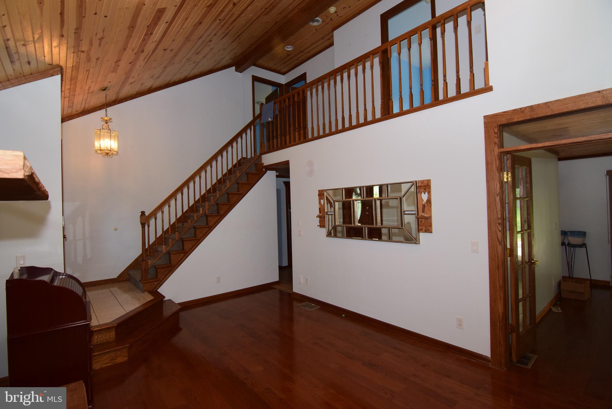 1296 Sunnyside Hollow Road Port Matilda, PA 16870 - Photo 18 of 49 a view of entryway with wooden floor