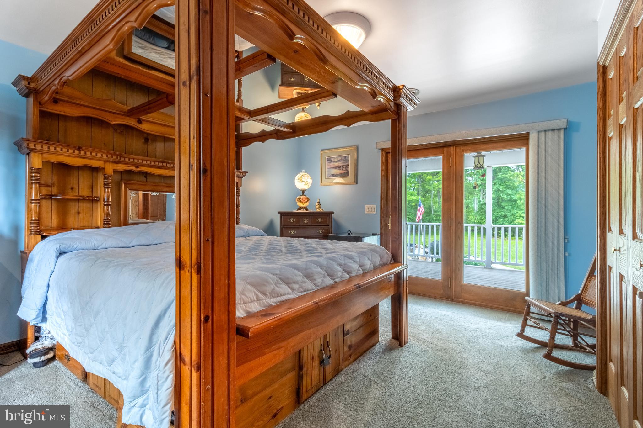 1296 Sunnyside Hollow Road Port Matilda, PA 16870 - Photo 32 of 49 a bed room with a bed and a mirror