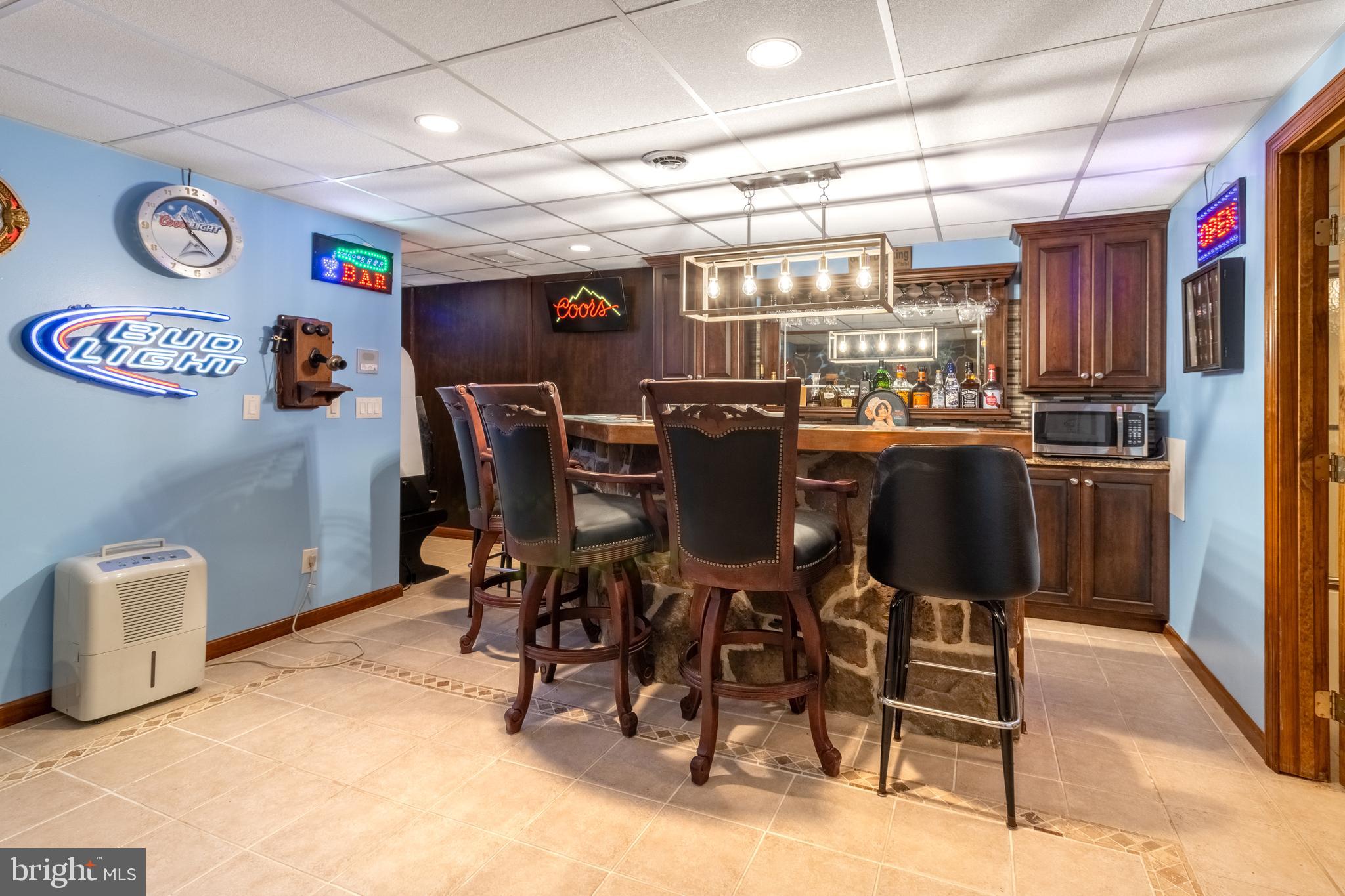 1296 Sunnyside Hollow Road Port Matilda, PA 16870 - Photo 43 of 49 a view of a dining room with furniture