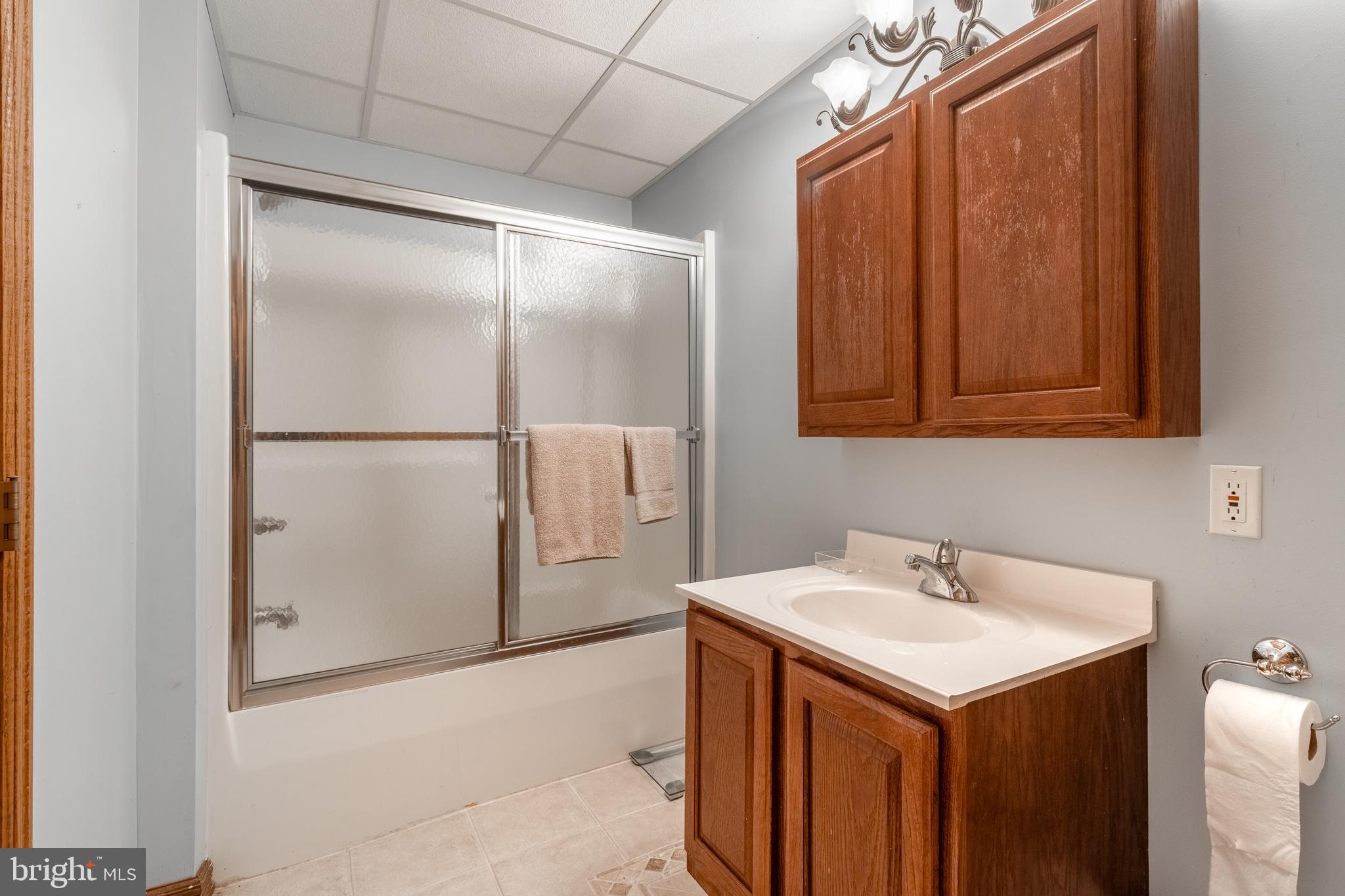 1296 Sunnyside Hollow Road Port Matilda, PA 16870 - Photo 46 of 49 a bathroom with a sink and mirror