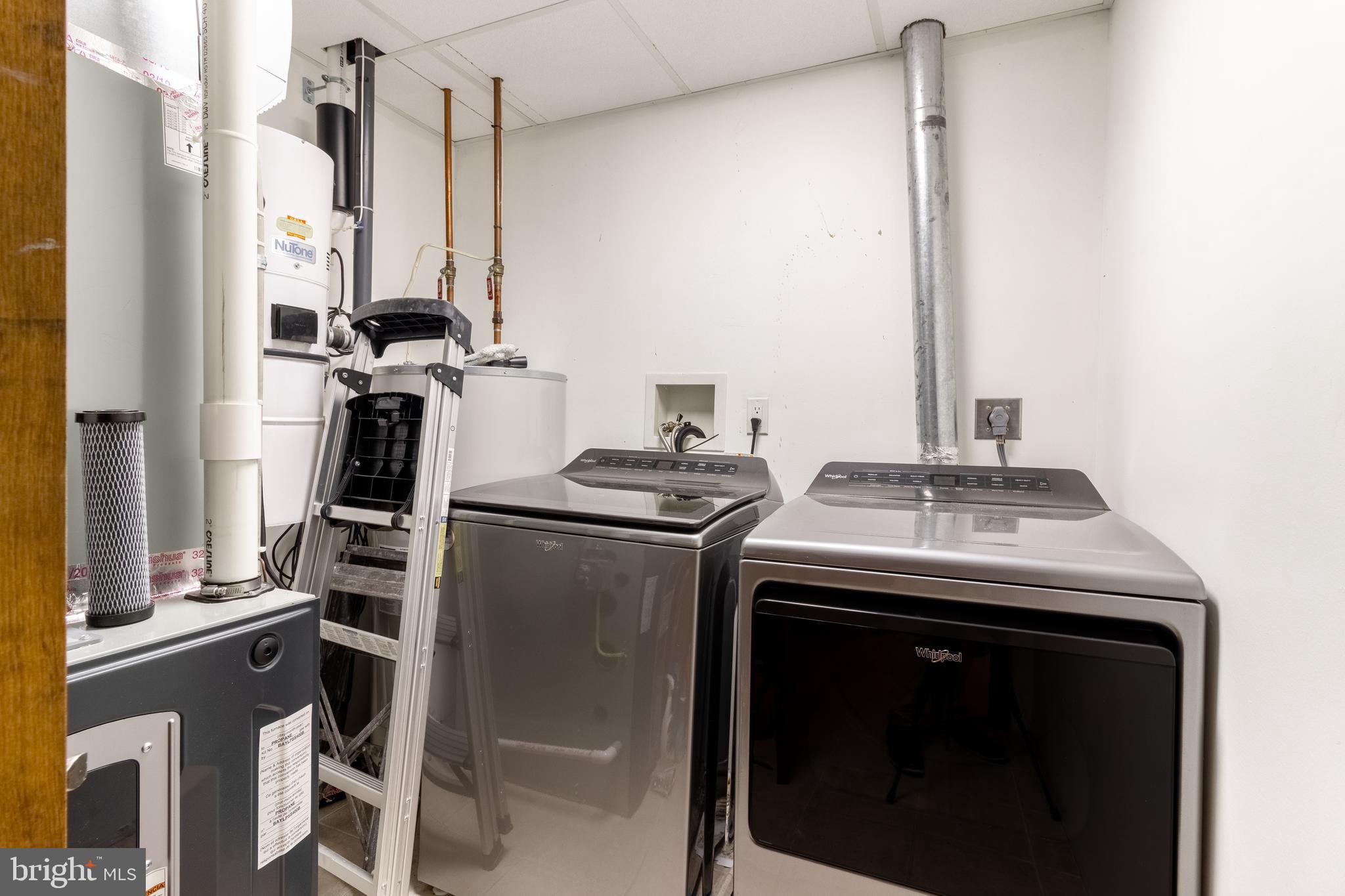 1296 Sunnyside Hollow Road Port Matilda, PA 16870 - Photo 47 of 49 a kitchen with a sink stove and refrigerator