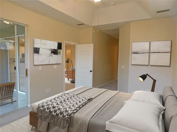 a bedroom with a bed and a cabinets
