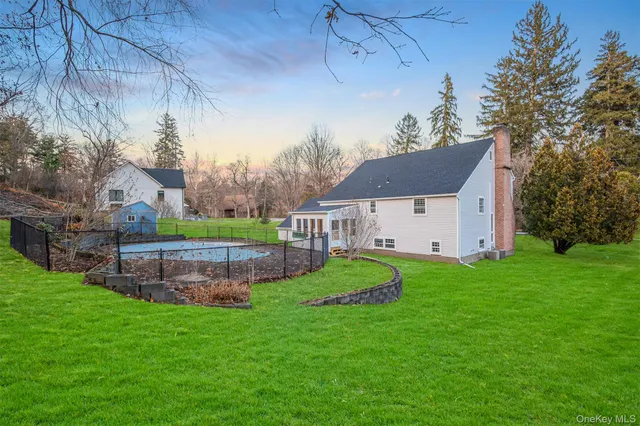 a house view with a garden space