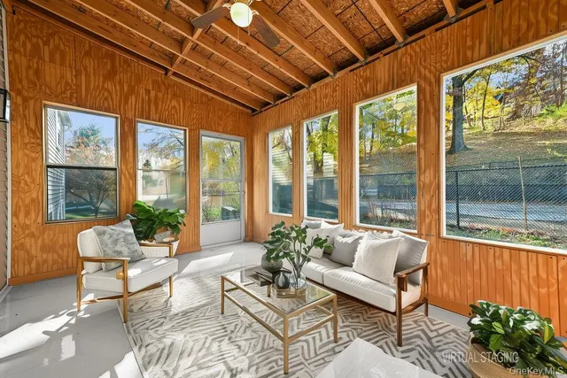 a kitchen with stainless steel appliances granite countertop a refrigerator sink and white cabinets