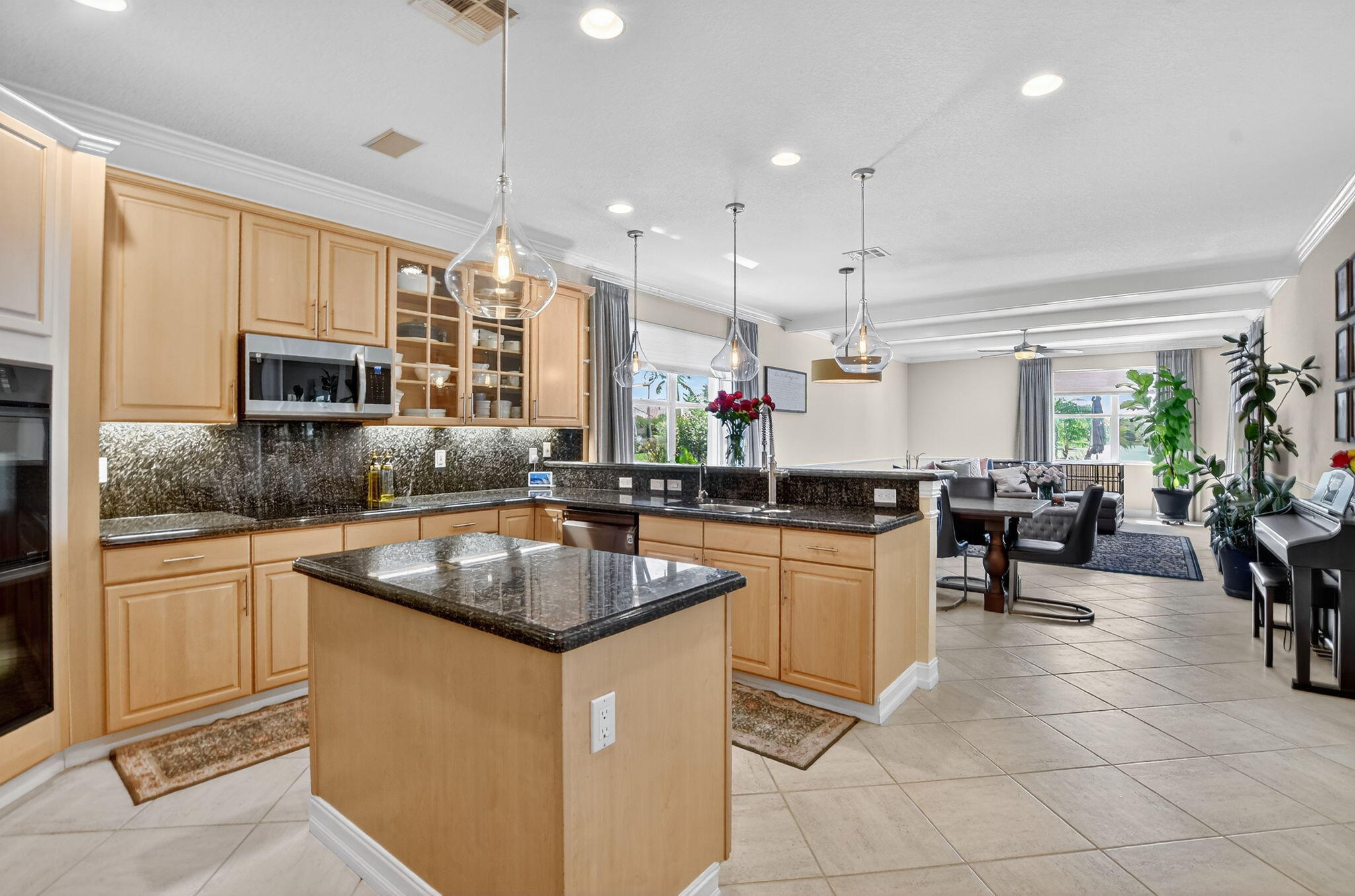 21383 Falls Ridge Way Boca Raton, FL 33428 - Photo 15 of 44 a kitchen with sink cabinets and window