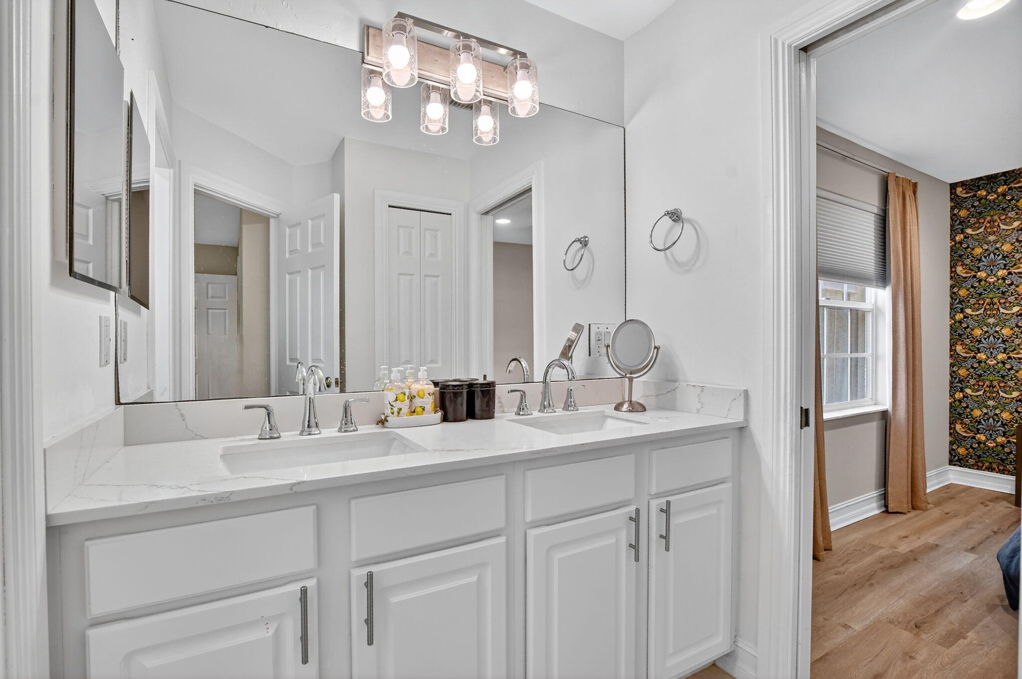 21383 Falls Ridge Way Boca Raton, FL 33428 - Photo 23 of 44 a bathroom with double vanity sinks a vanity and a mirror