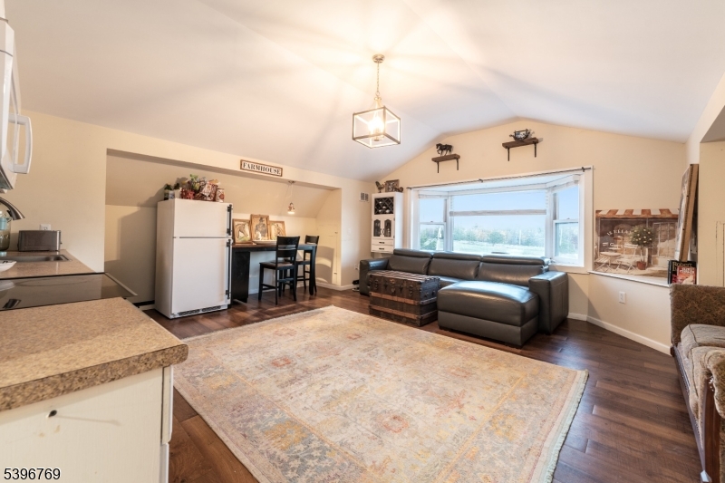 231 Wertsville Road Ringoes, NJ 08551 - Photo 2 of 11 a living room with furniture and a flat screen tv