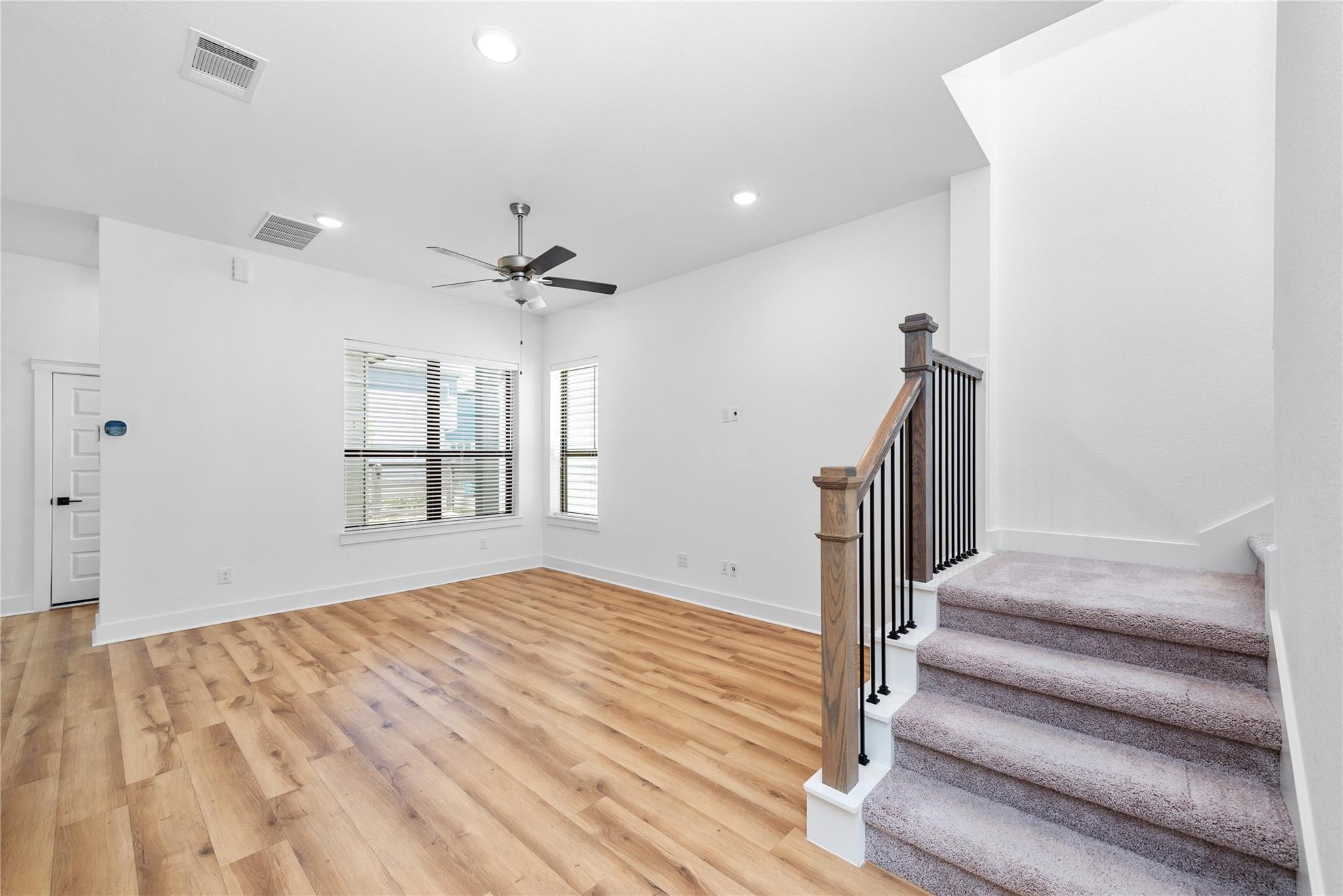 18618 Courteous Way Cypress, TX 77433 - Photo 11 of 30 a view of entryway and hall with wooden floor
