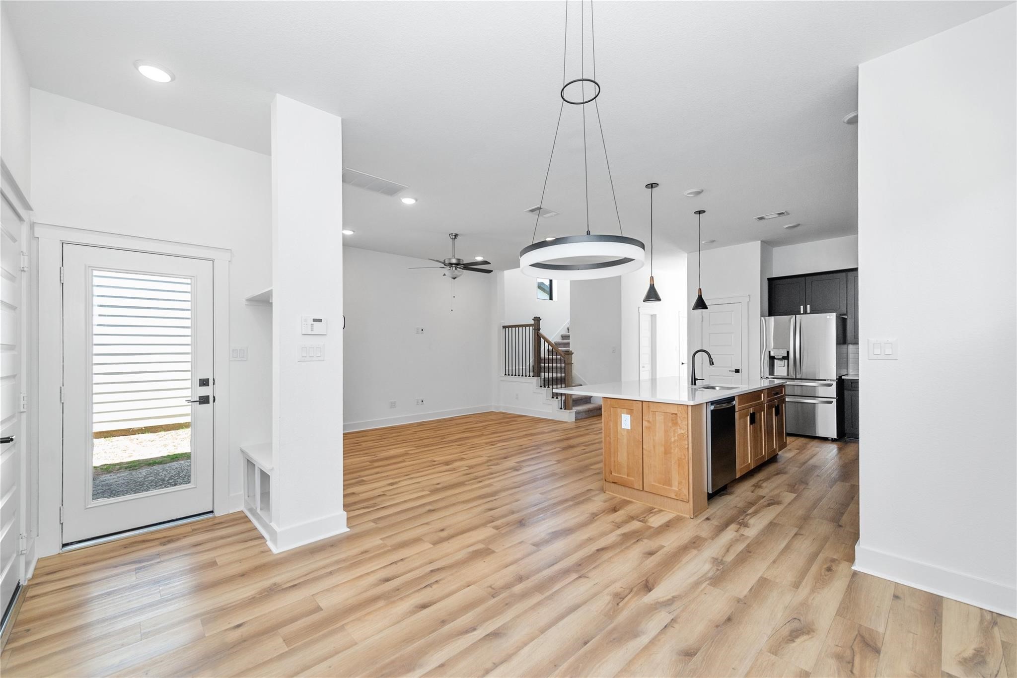 18618 Courteous Way Cypress, TX 77433 - Photo 12 of 30 a large kitchen with a lot of counter space and a wooden floor