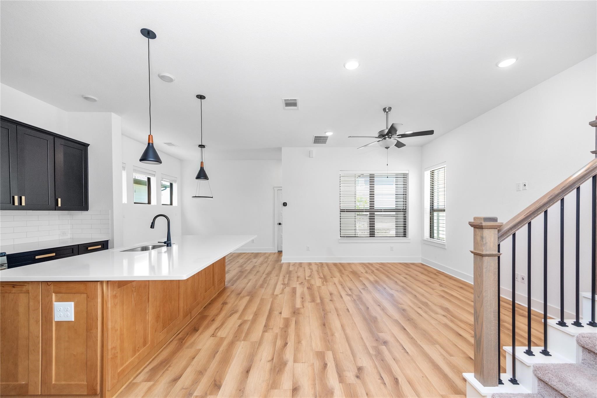 18618 Courteous Way Cypress, TX 77433 - Photo 16 of 30 a very nice looking room with a large window and chandelier