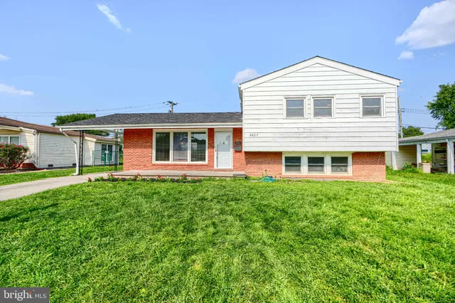 a view of a building with a yard