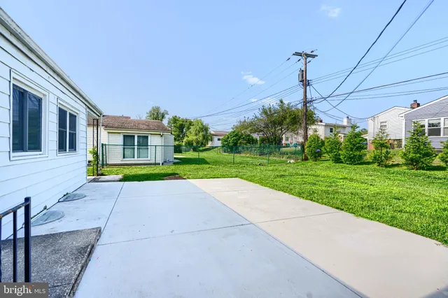 a view of a yard with a slide