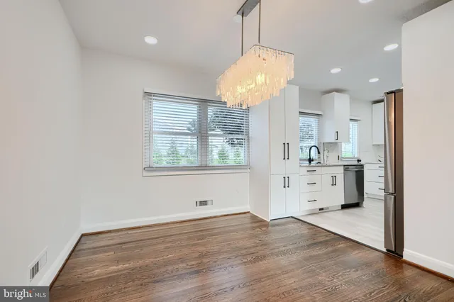 a view of kitchen and windows