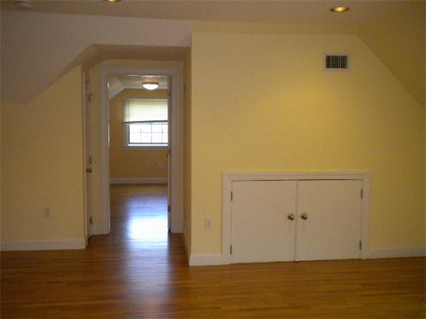 38 Fuller Street Brookline, MA 02446 - Photo 21 of 28 a view of a room with wooden floor