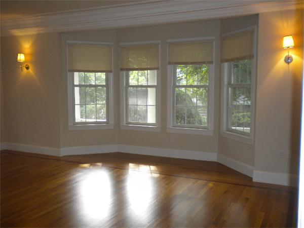 38 Fuller Street Brookline, MA 02446 - Photo 10 of 28 a view of empty room with wooden floor and fan