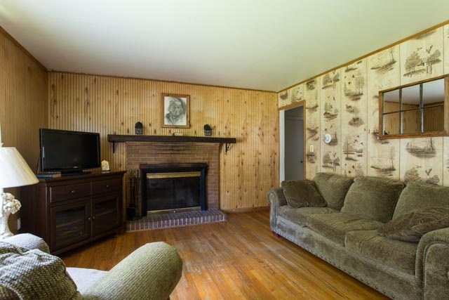 112 Robinhood Road Staunton, VA 24401 - Photo 4 of 18 a living room with furniture a flat screen tv and a fireplace