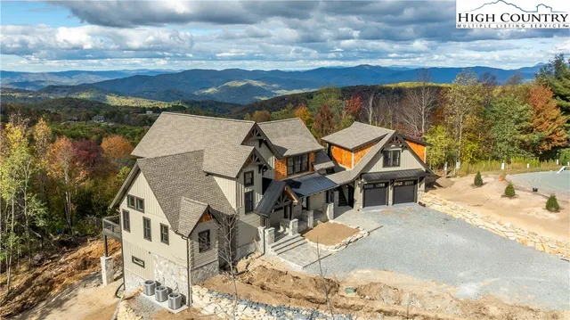 a view of a house with a ocean view