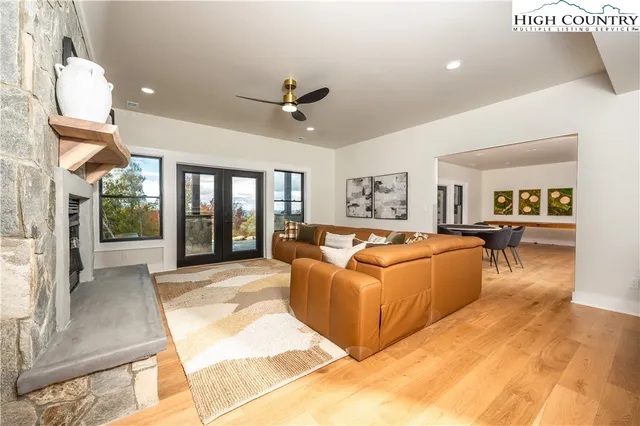a bathroom with a granite countertop sink a mirror and a window