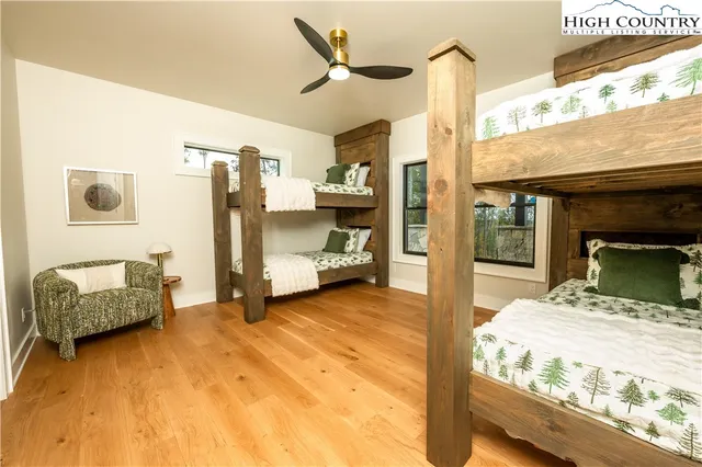 a bathroom with a granite countertop sink a vanity and a mirror