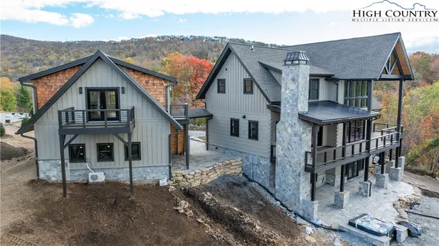 a view of balcony with couch and outdoor seating