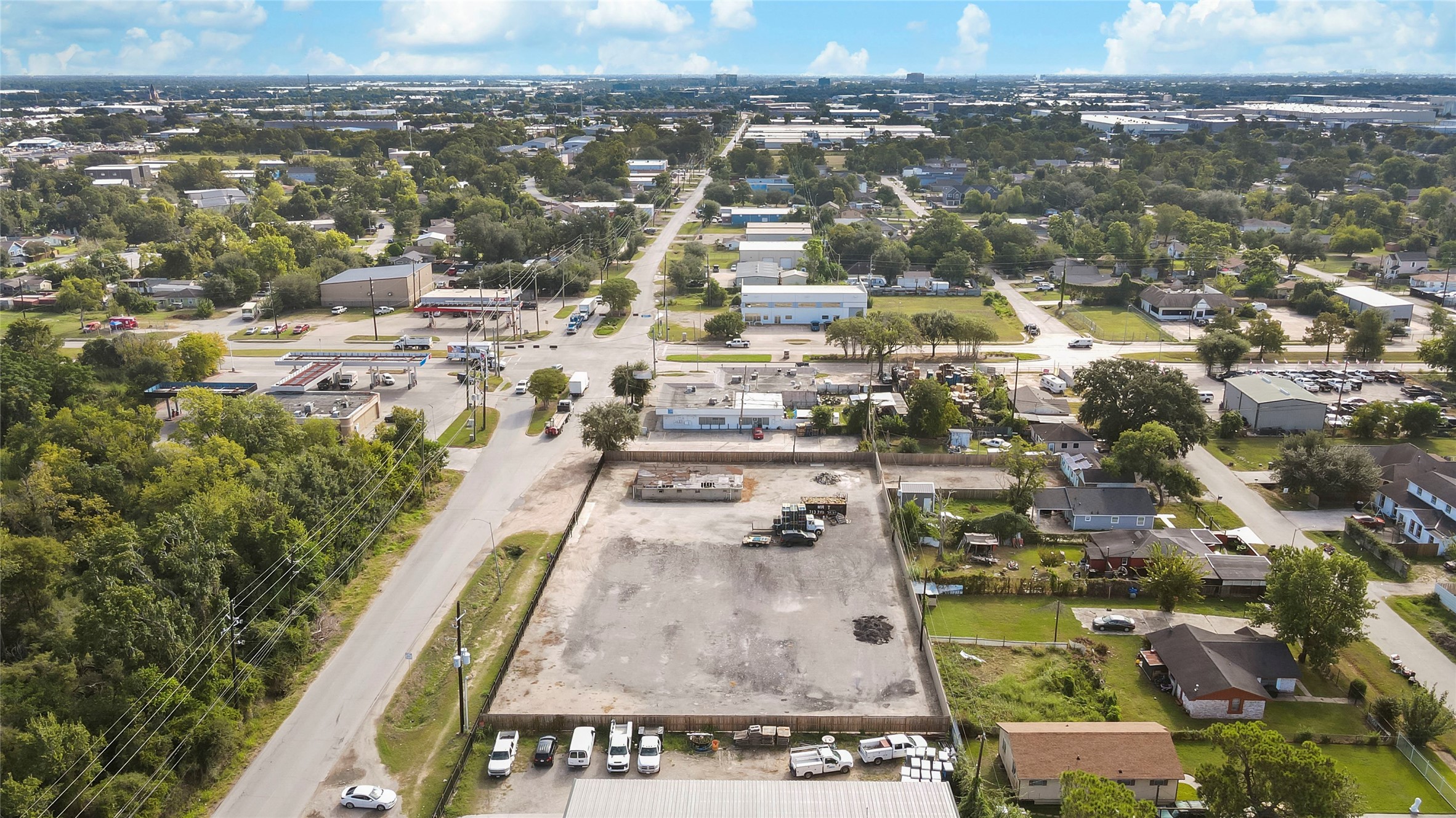 10215 Tanner Road Houston, TX 77041 - Photo 2 of 10 an aerial view of residential houses with city view