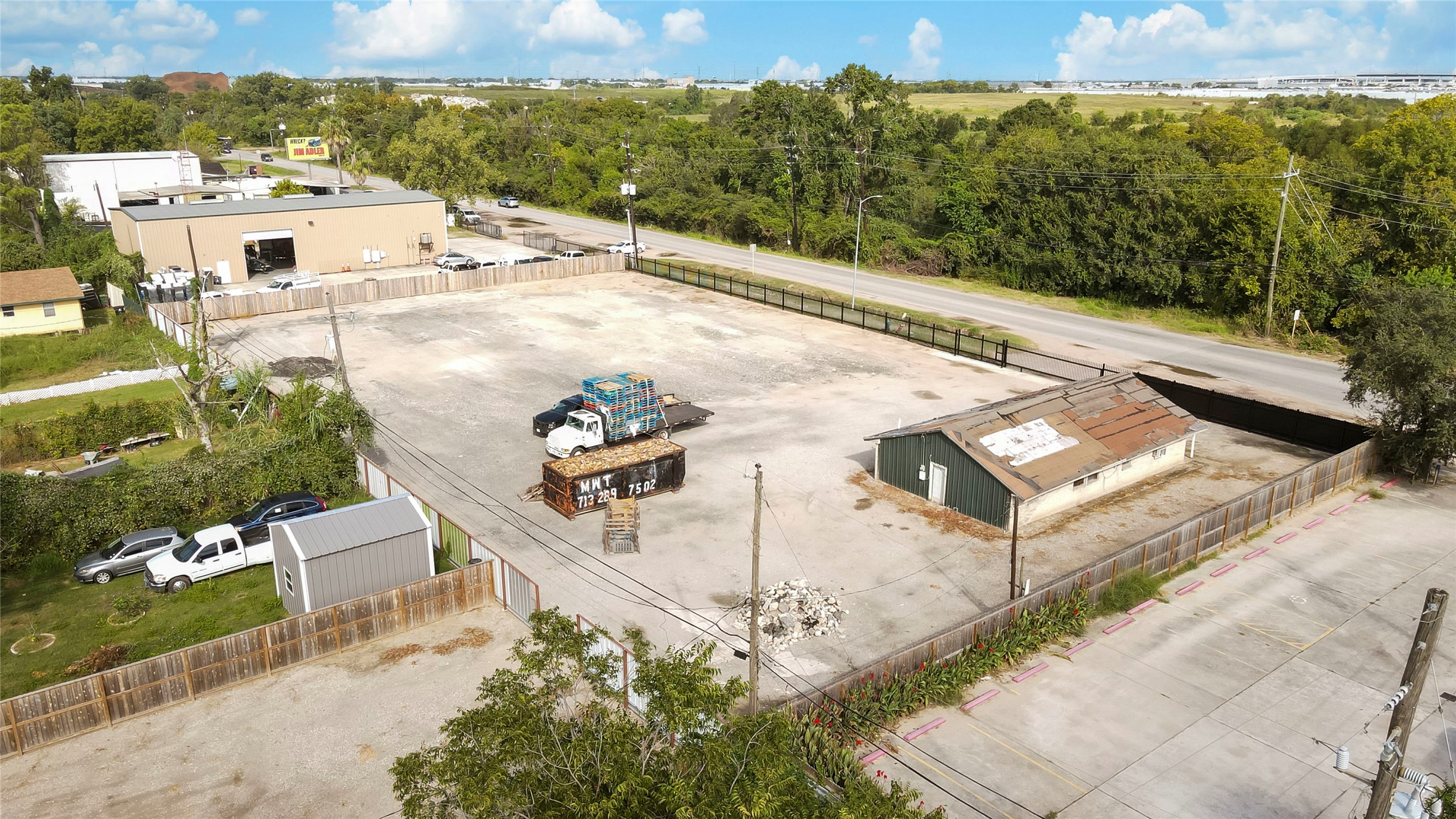 10215 Tanner Road Houston, TX 77041 - Photo 6 of 10 a view of a house with a yard