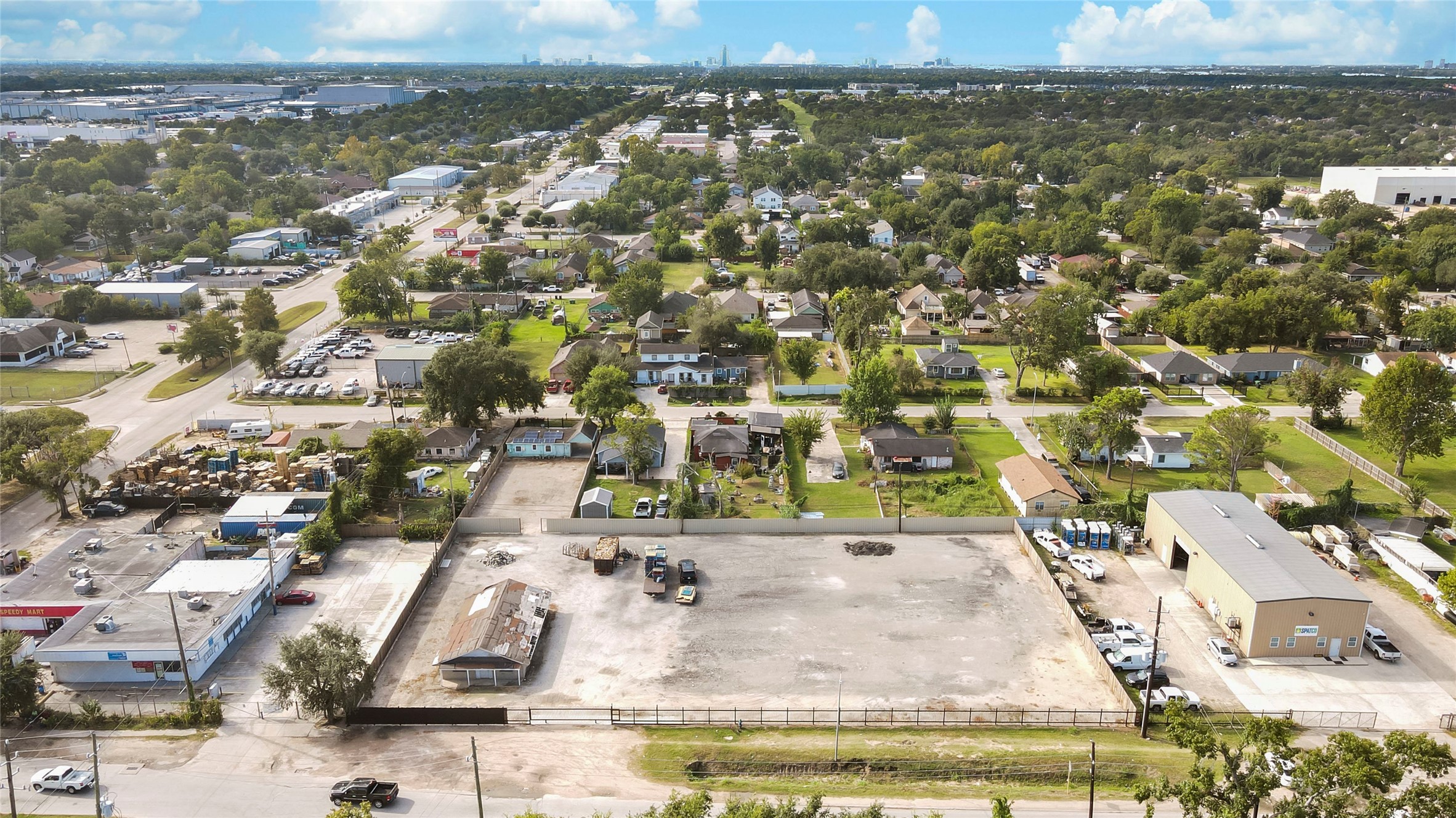 10215 Tanner Road Houston, TX 77041 - Photo 7 of 10 an aerial view of residential houses with outdoor space