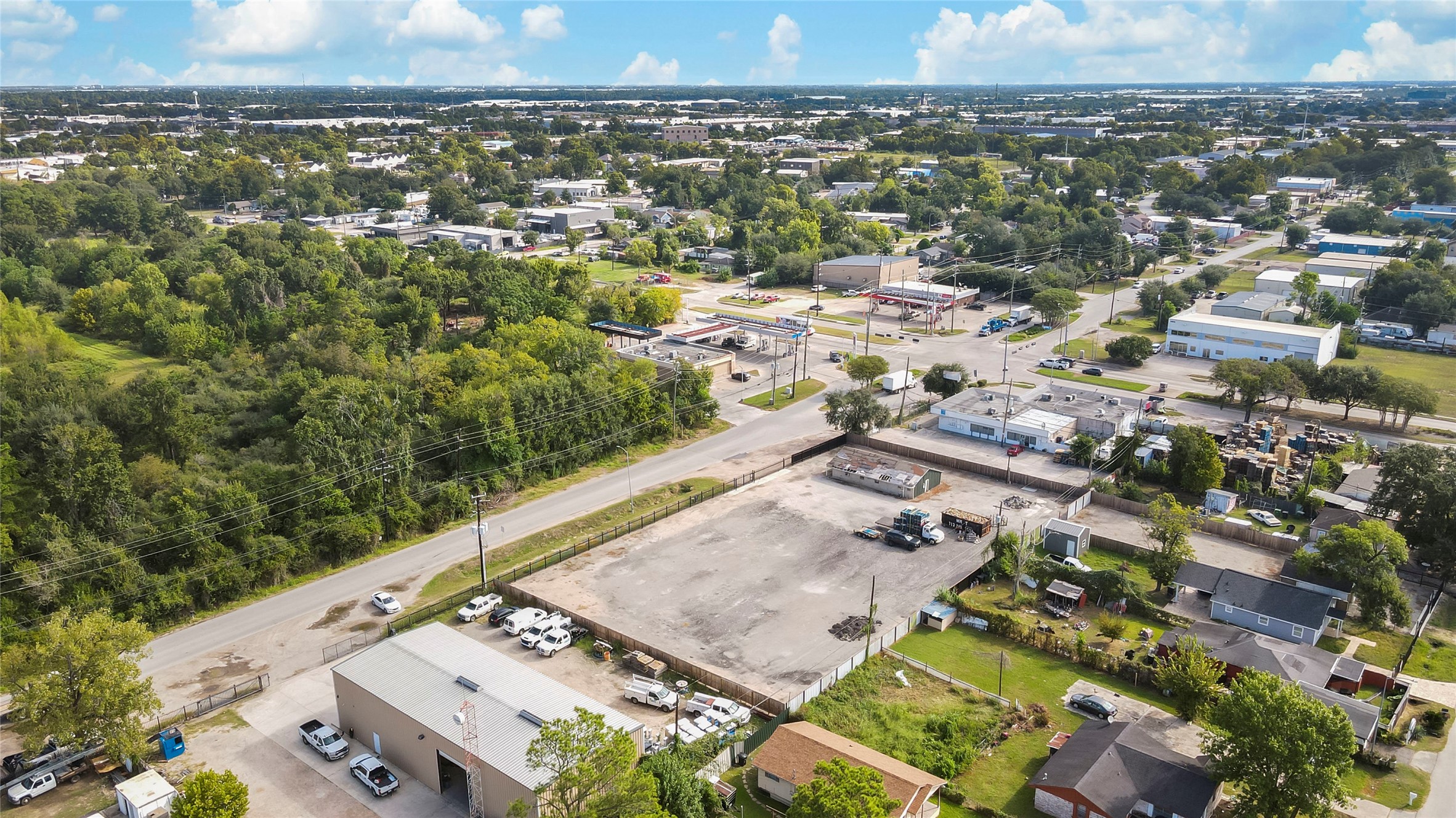 10215 Tanner Road Houston, TX 77041 - Photo 8 of 10 an aerial view of a residential houses with city view
