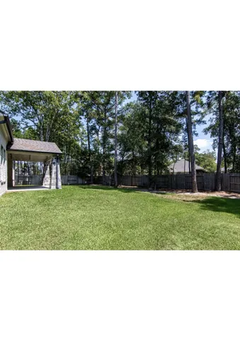 $619,999 | 323 Calmato Woods Way, Willis, TX 77318