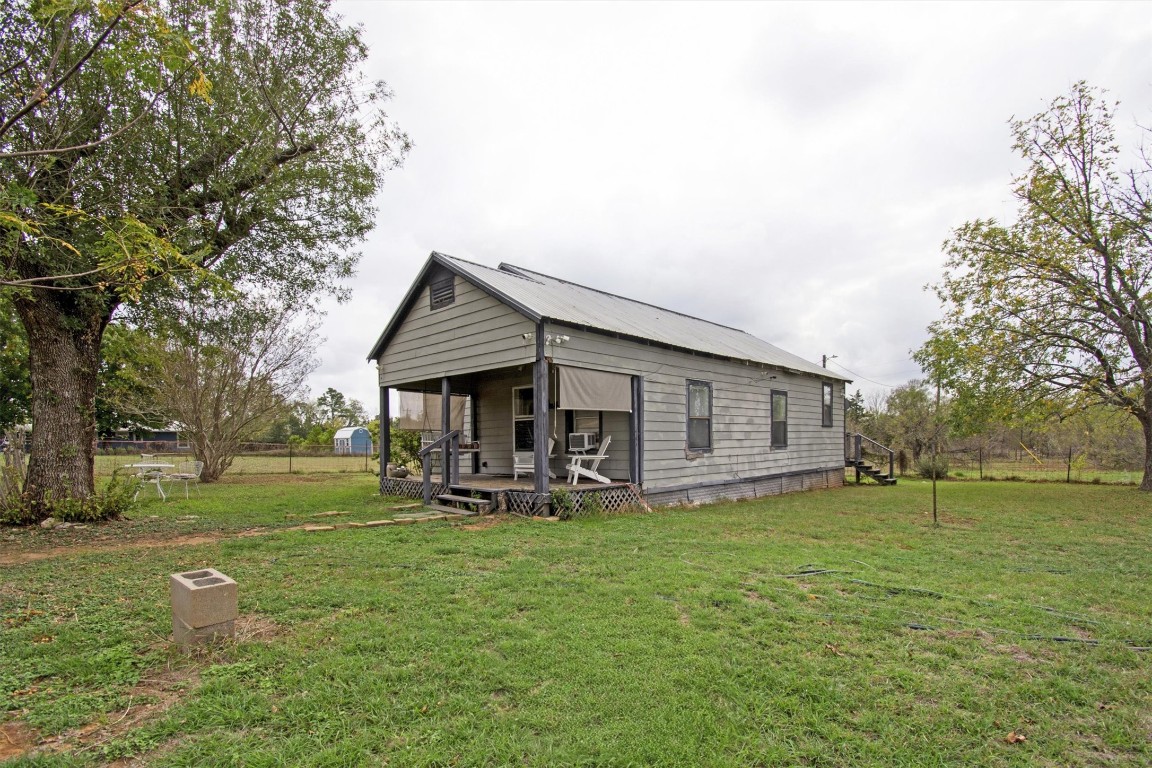 163 Lower Elgin Road Elgin, TX 78621 - Photo 6 of 9 a view of a house with a yard