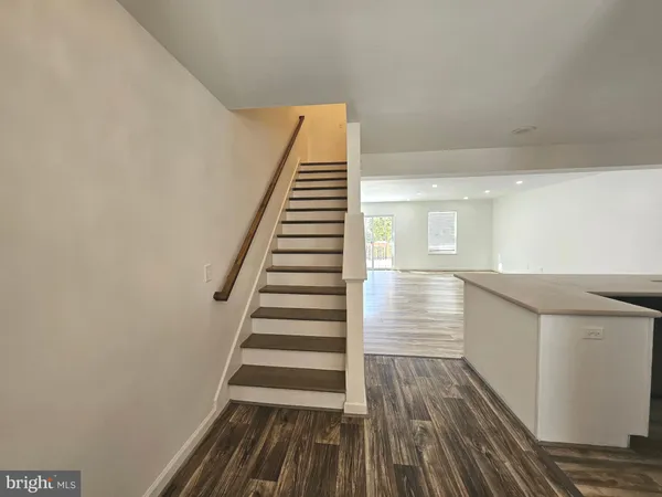 a view of entryway with wooden floor