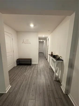 a view of entryway with wooden floor