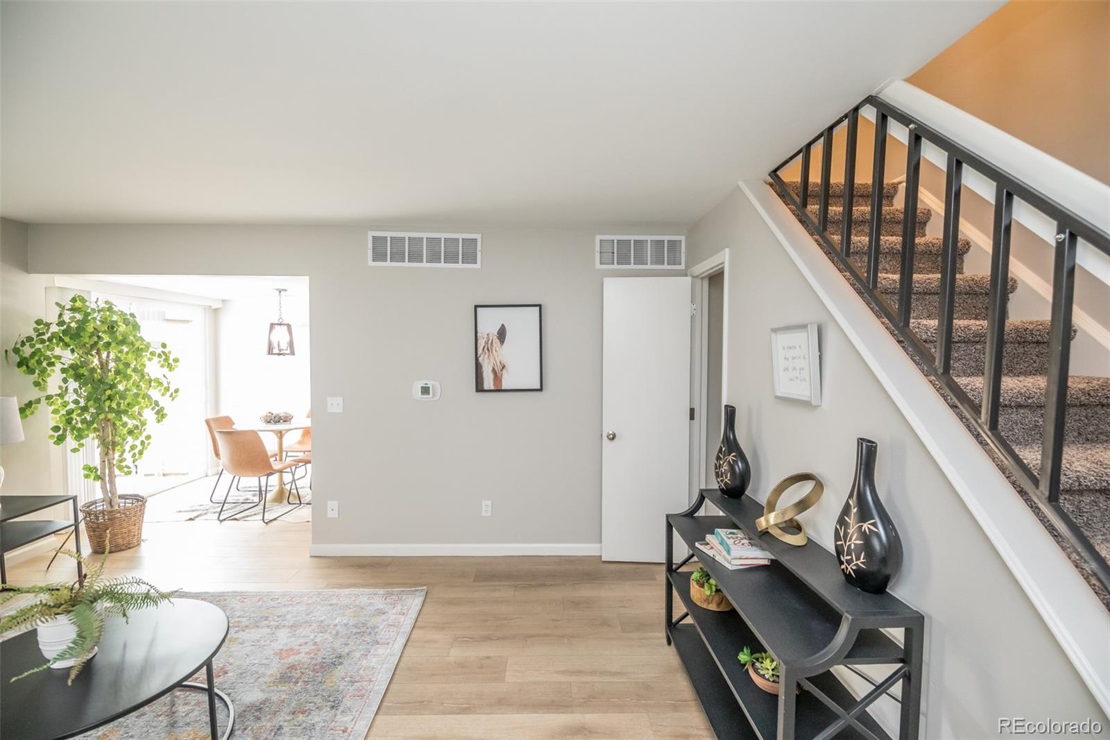 7906 Chase Circle, Unit 143 Arvada, CO 80003 - Photo 2 of 38 a living room with furniture