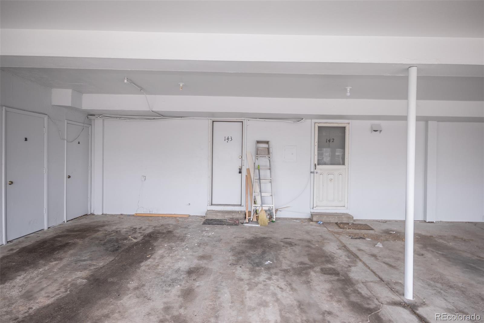 7906 Chase Circle, Unit 143 Arvada, CO 80003 - Photo 23 of 38 a view of a garage