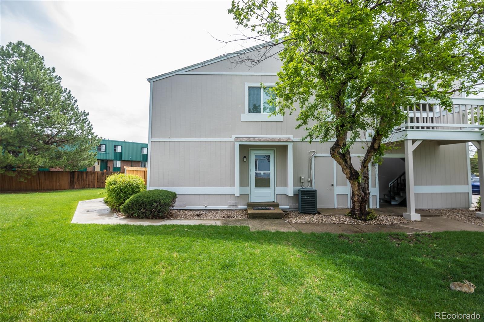 7906 Chase Circle, Unit 143 Arvada, CO 80003 - Photo 33 of 38 a front view of house with yard