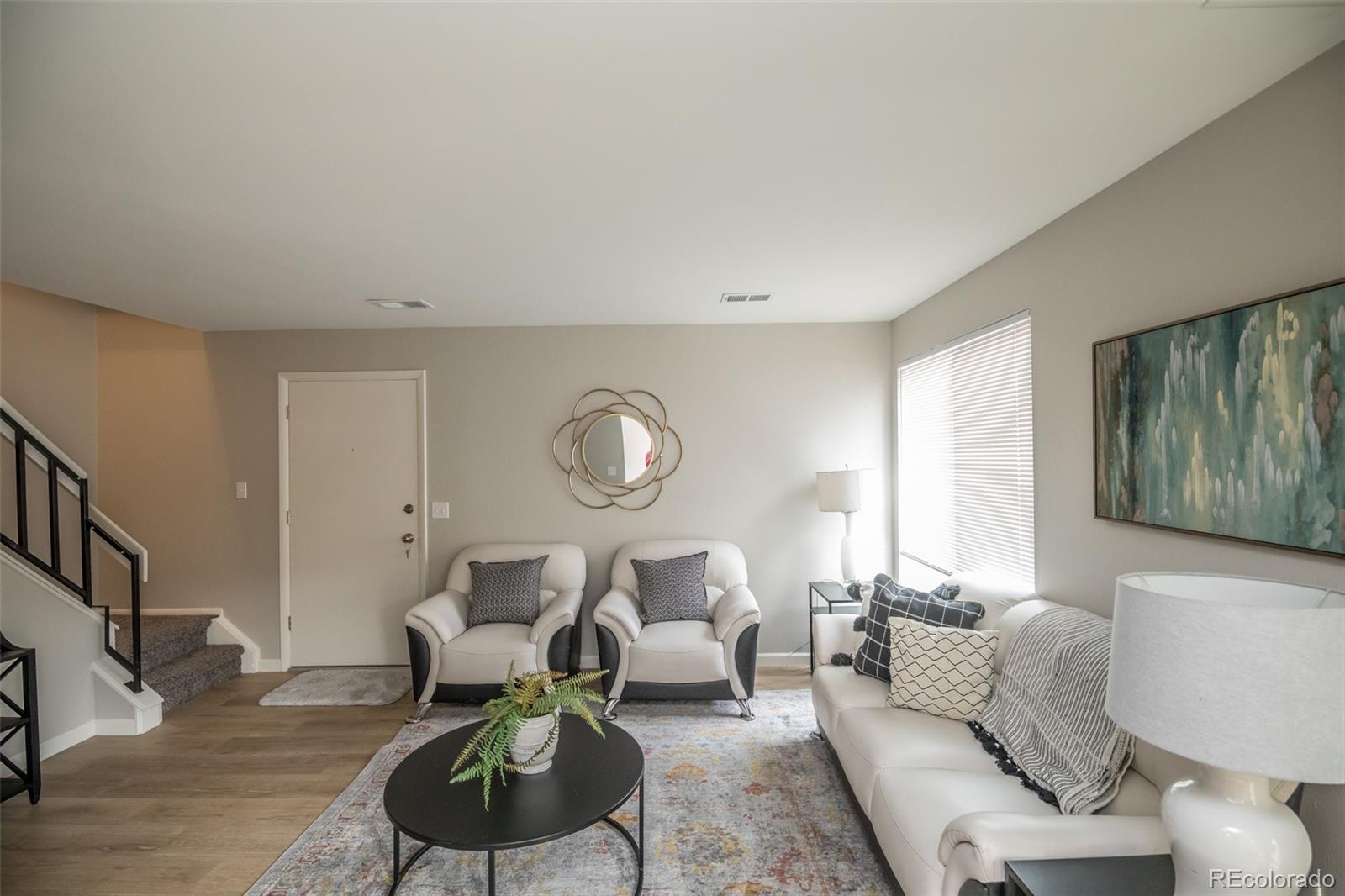7906 Chase Circle, Unit 143 Arvada, CO 80003 - Photo 5 of 38 a living room with furniture