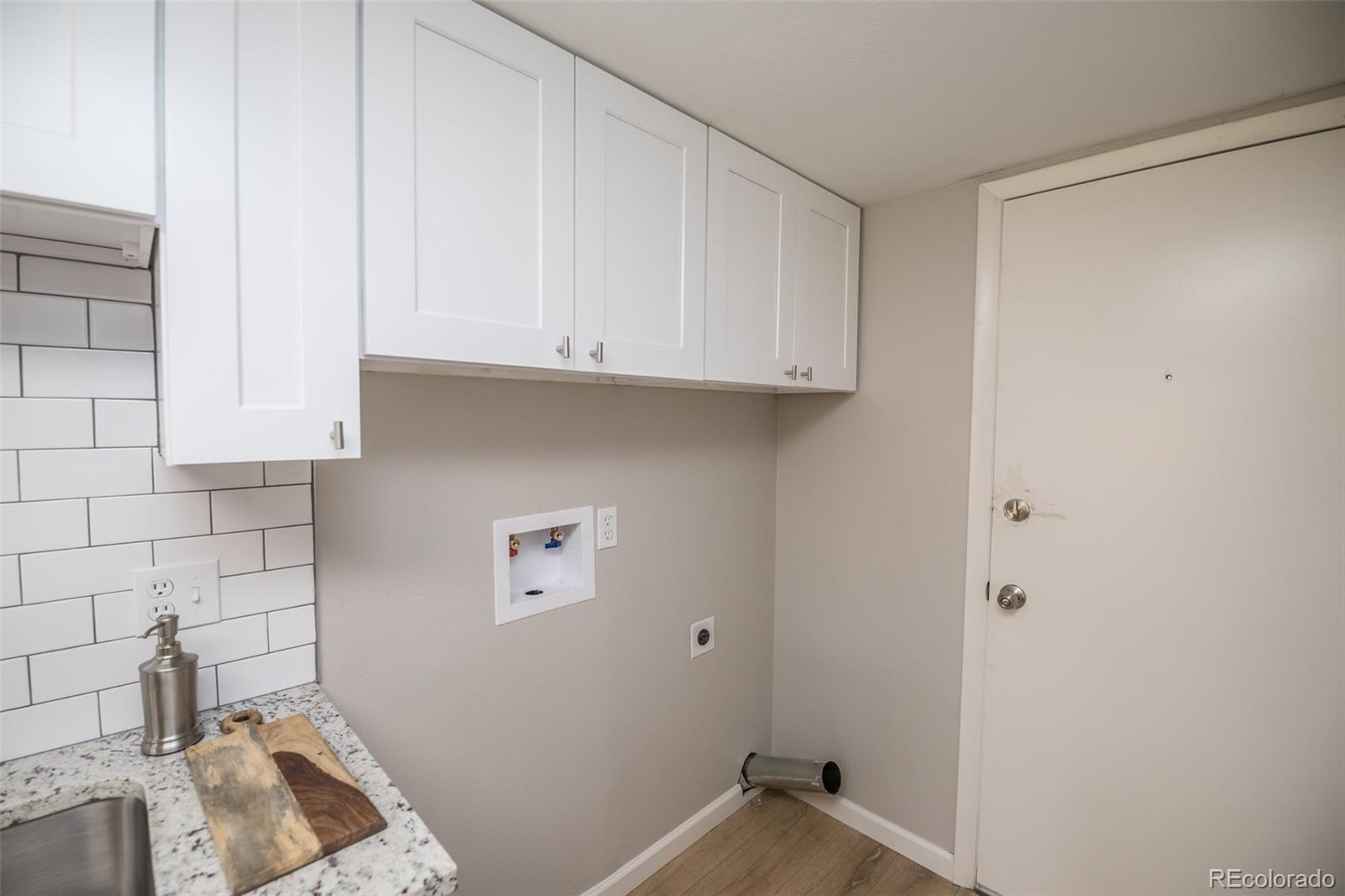 7906 Chase Circle, Unit 143 Arvada, CO 80003 - Photo 10 of 38 a room with cabinets