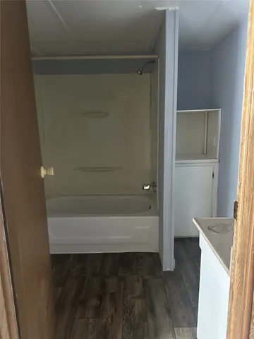 a bathroom with a bathtub