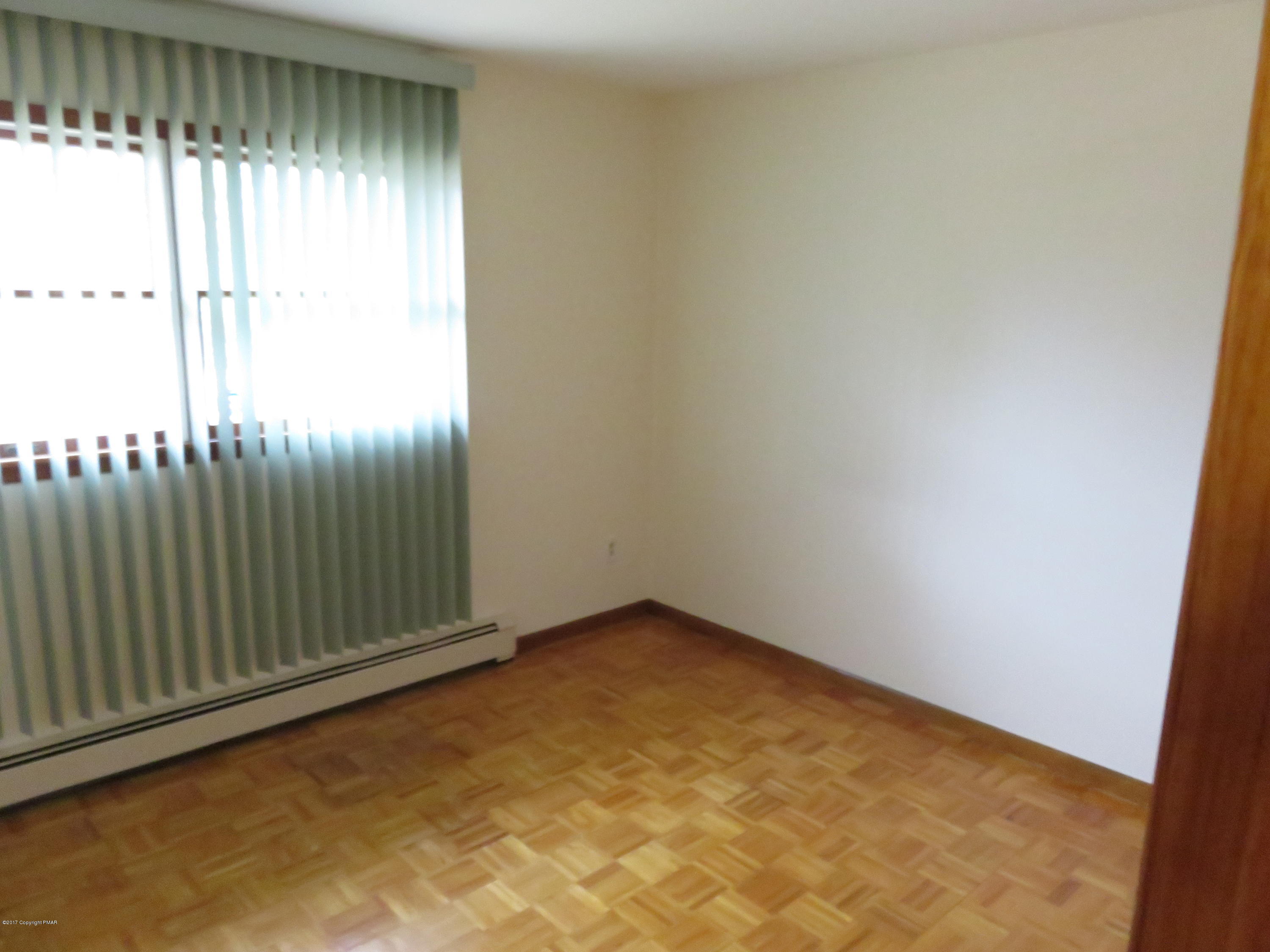 168 Turkey Ridge Kunkletown, PA 18058 - Photo 13 of 33 an empty room with a window