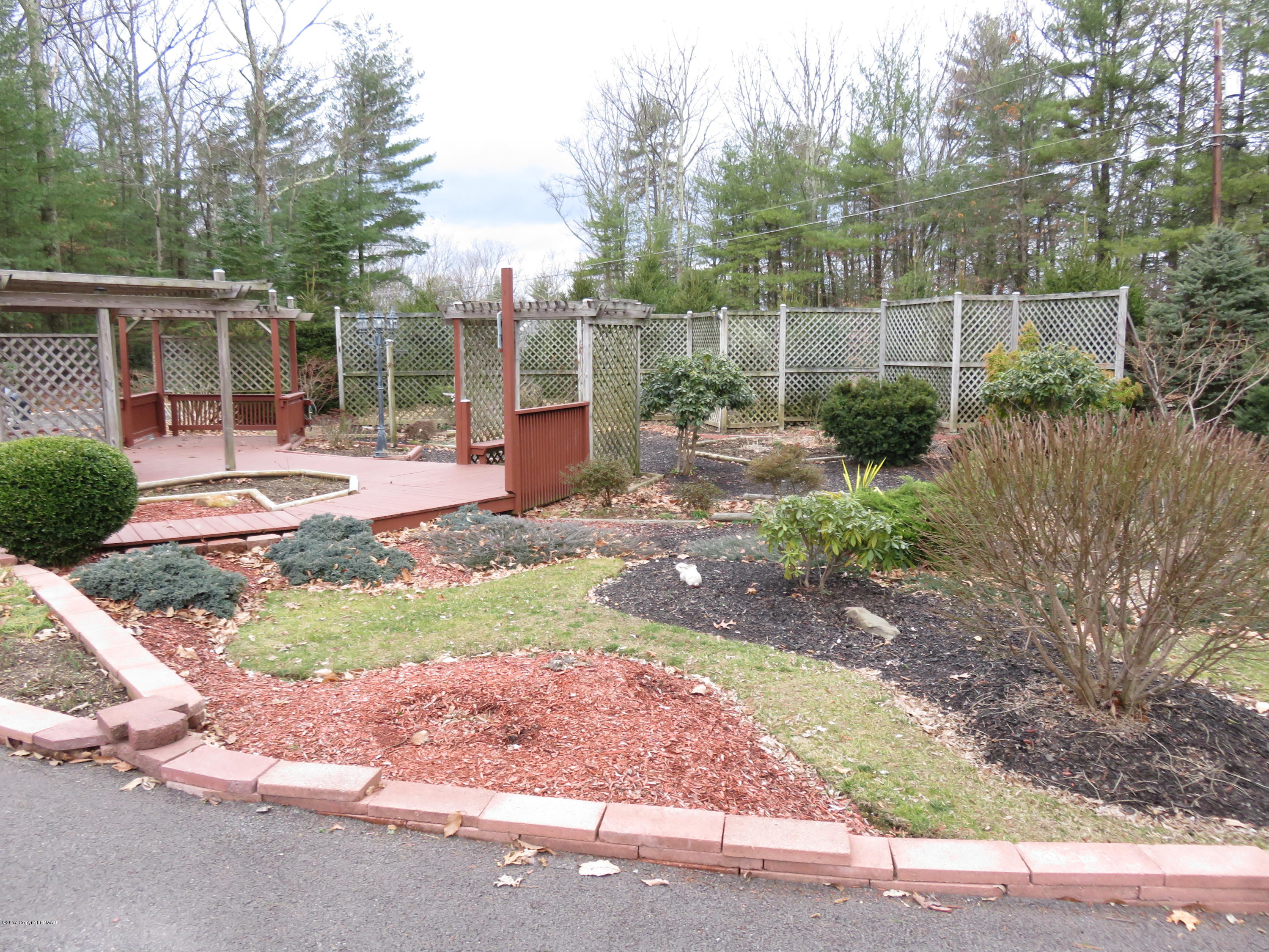 168 Turkey Ridge Kunkletown, PA 18058 - Photo 33 of 33 a view of a backyard with plants and patio